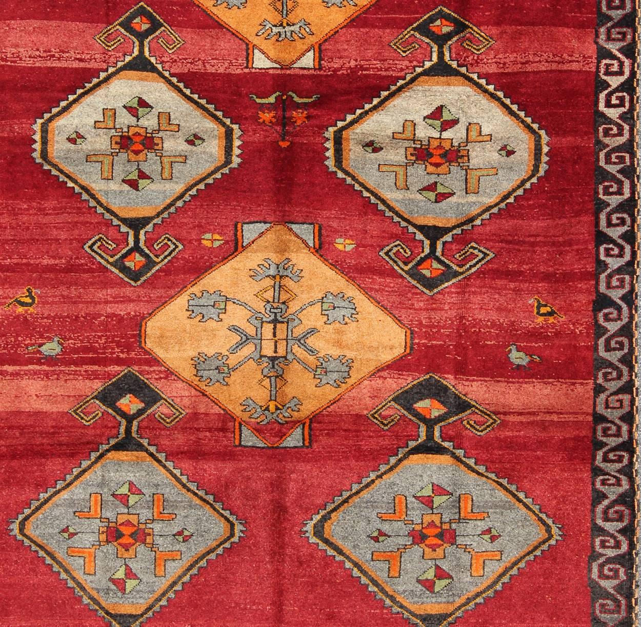 Oushak Vintage Turkish Kars Rug with Striated Red Field and Six Central Medallions