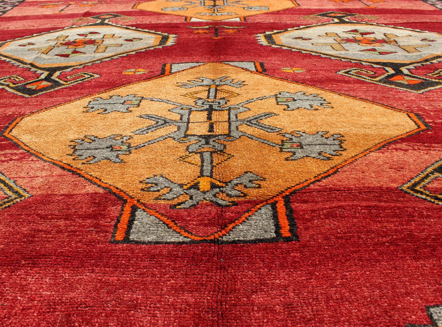 Hand-Knotted Vintage Turkish Kars Rug with Striated Red Field and Six Central Medallions