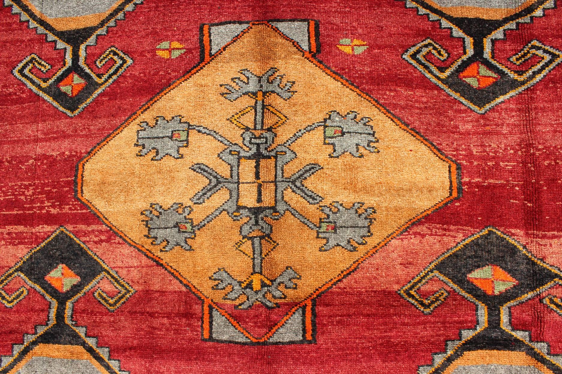 Vintage Turkish Kars Rug with Striated Red Field and Six Central Medallions In Excellent Condition In Atlanta, GA