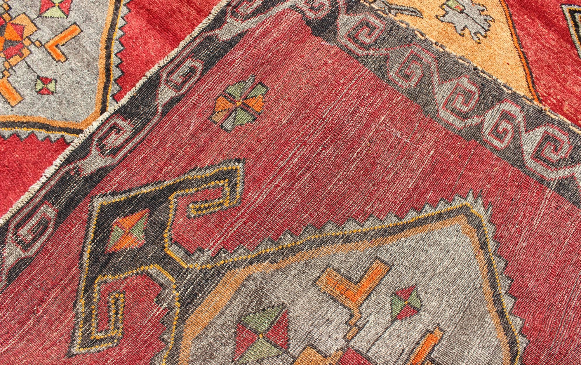 20th Century Vintage Turkish Kars Rug with Striated Red Field and Six Central Medallions