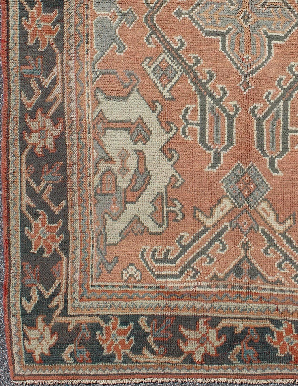  Early 20th Century Antique Turkish Oushak Rug. Antique Oushak Rug from Turkey with Central Medallion and Sub-Geometric Elements   rug/F-0912


This antique Turkish Oushak carpet features a central medallion design, as well as patterns of smaller