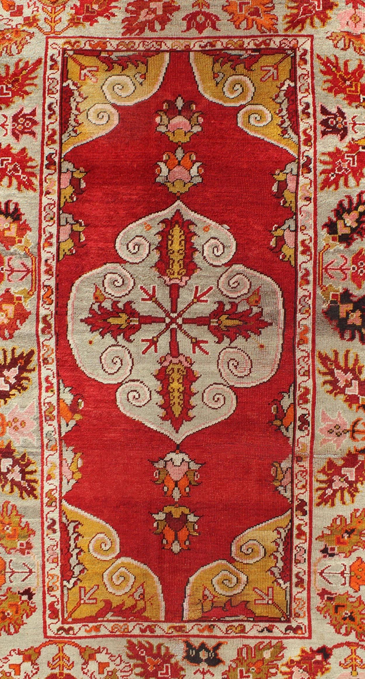 Hand-Knotted Center Medallion Antique Turkish Oushak Rug with Red Ground & Multi Colors For Sale