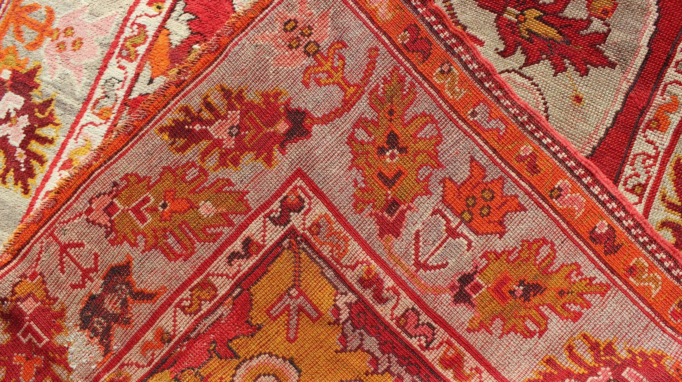Center Medallion Antique Turkish Oushak Rug with Red Ground & Multi Colors For Sale 1