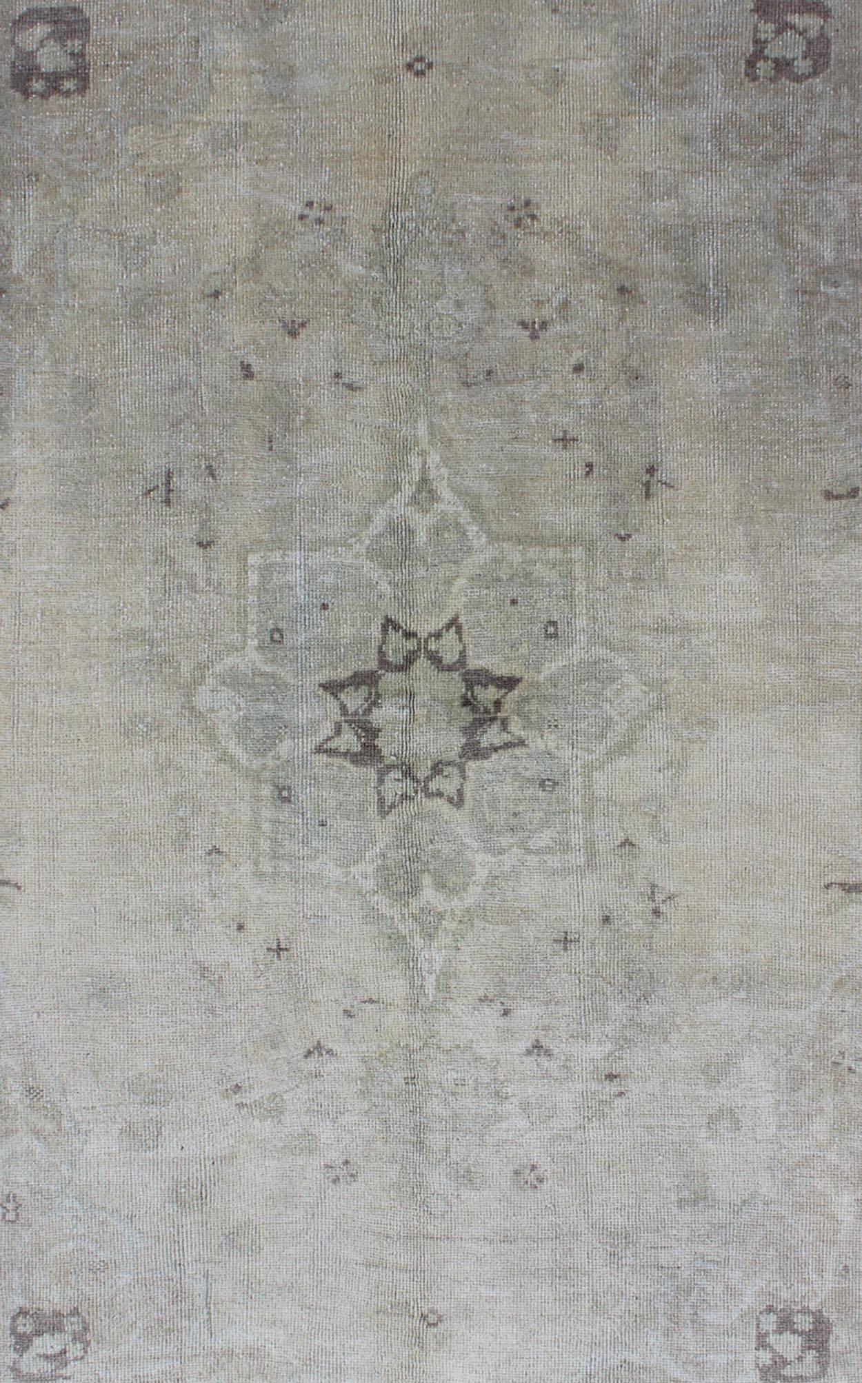 Hand-Knotted Muted Turkish Oushak Carpet with Center Medallion Design in Grey, Sand & Taupe For Sale