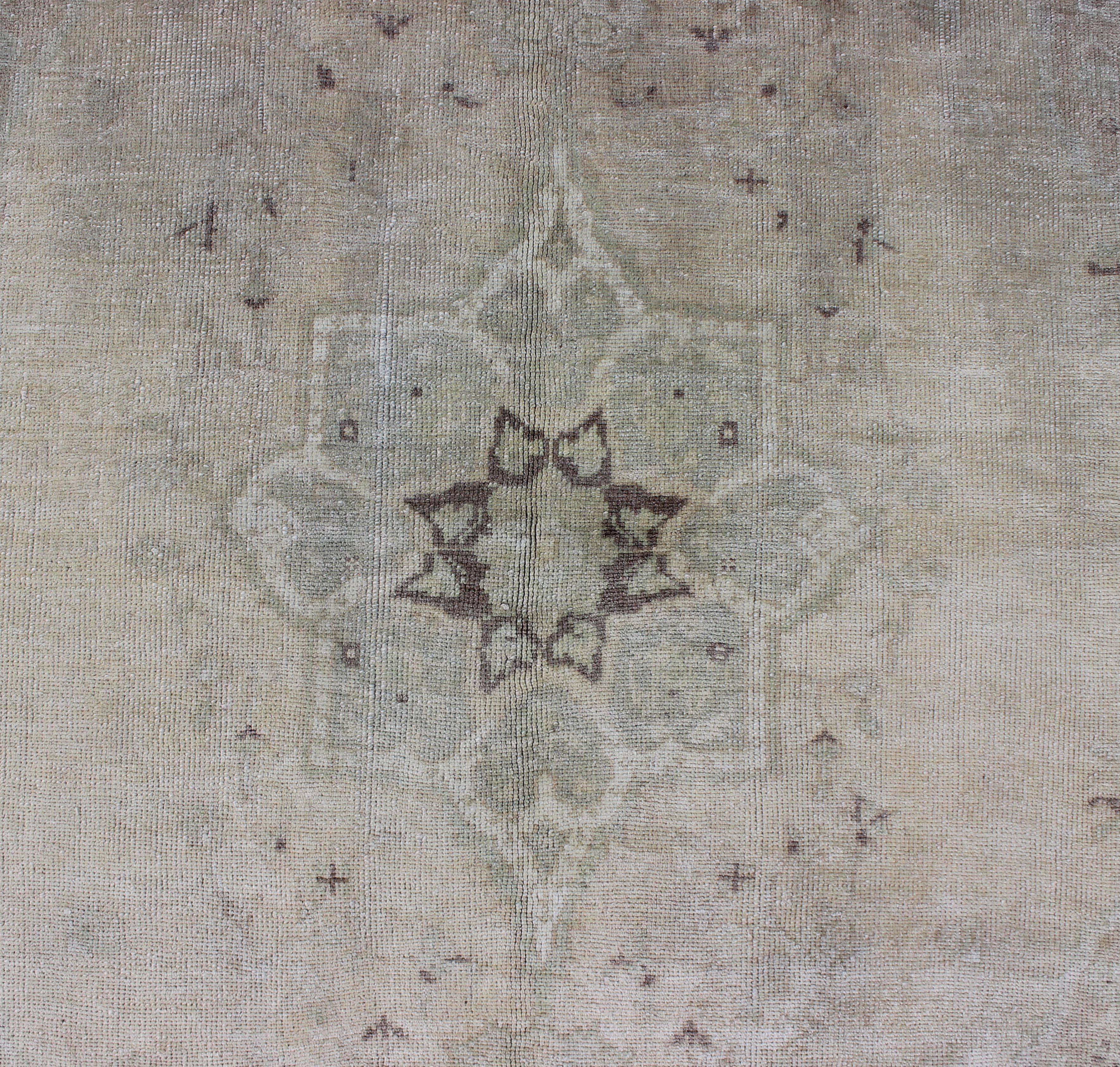 Wool Muted Turkish Oushak Carpet with Center Medallion Design in Grey, Sand & Taupe For Sale