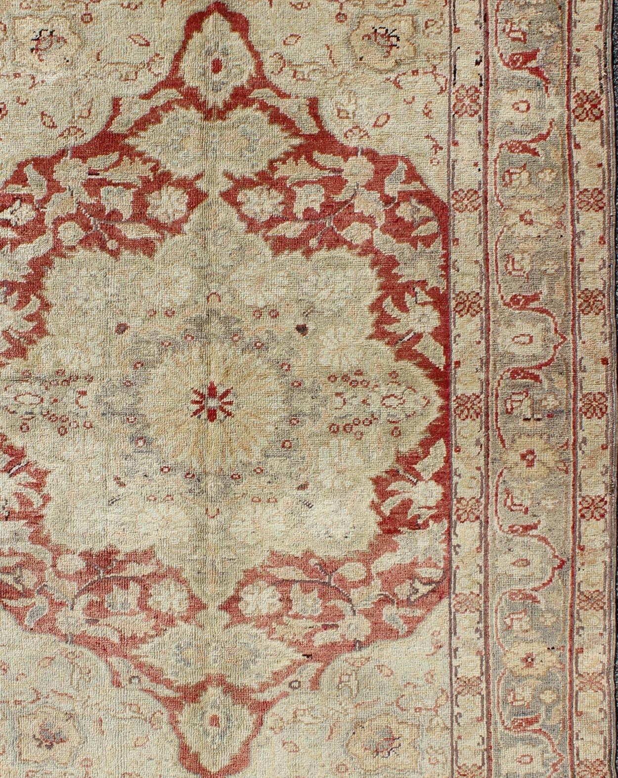 Fine Turkish Oushak Carpet with Center Medallion in Light Red and Cream In Excellent Condition For Sale In Atlanta, GA