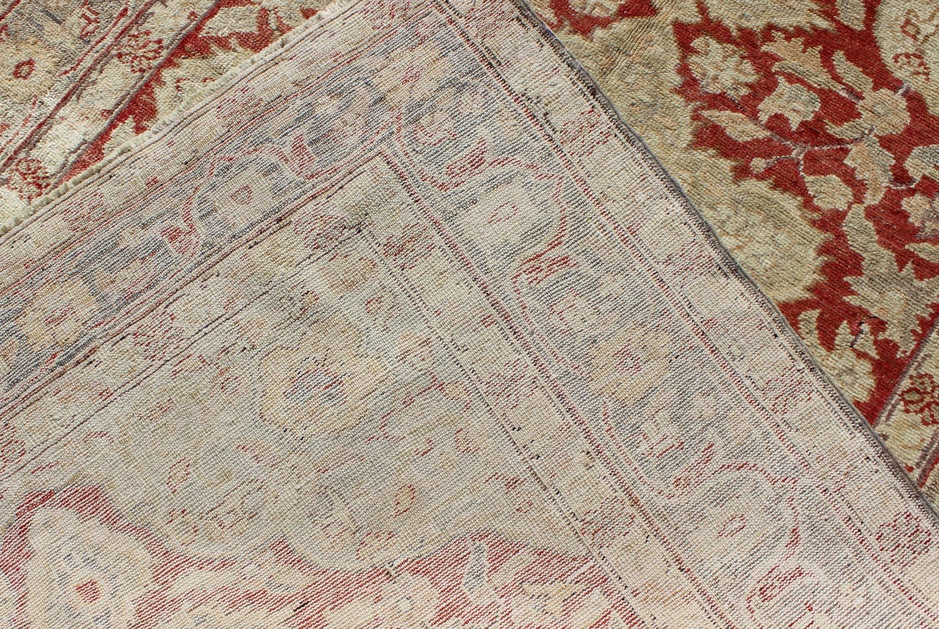 Wool Fine Turkish Oushak Carpet with Center Medallion in Light Red and Cream For Sale