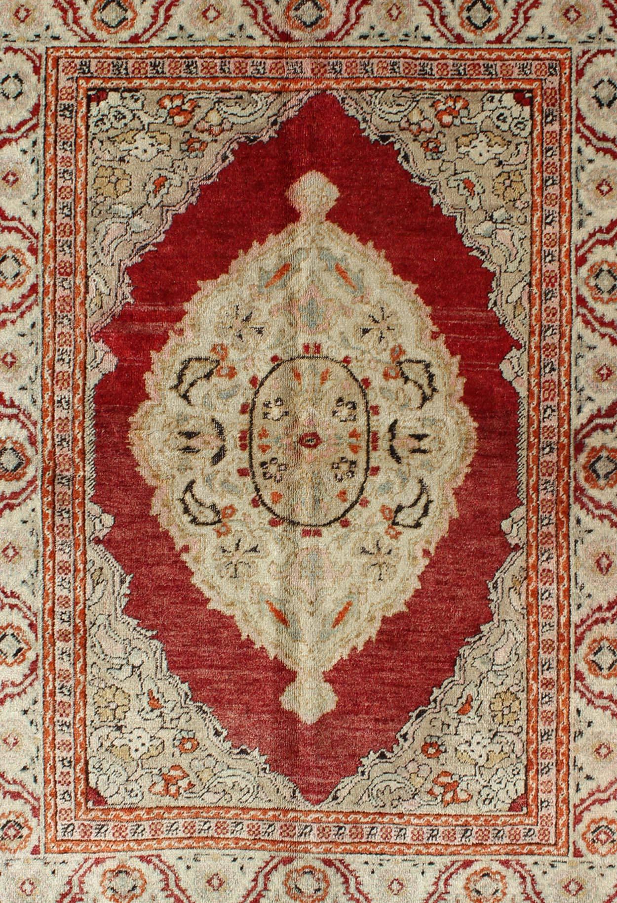 Turkish Antique Oushak Rug with Floral Medallion in Light Green, Ivory, Taupe & Red For Sale
