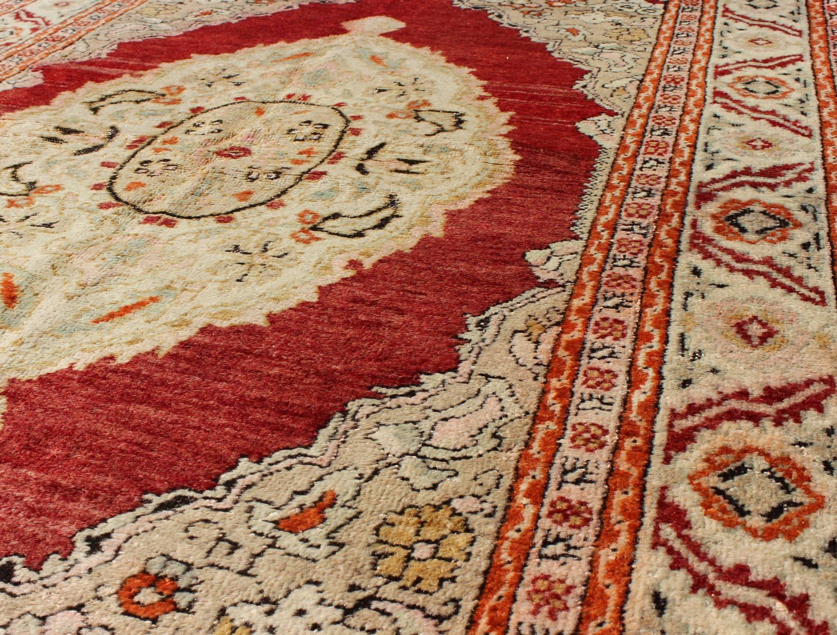 Antique Oushak Rug with Floral Medallion in Light Green, Ivory, Taupe & Red In Excellent Condition For Sale In Atlanta, GA