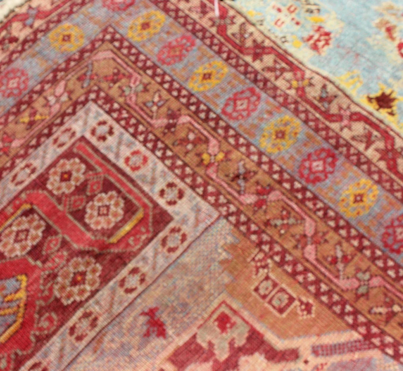 Antiker türkischer Oushak-Teppich mit lebhafter Farbpalette und Medaillon-Design (Frühes 20. Jahrhundert) im Angebot