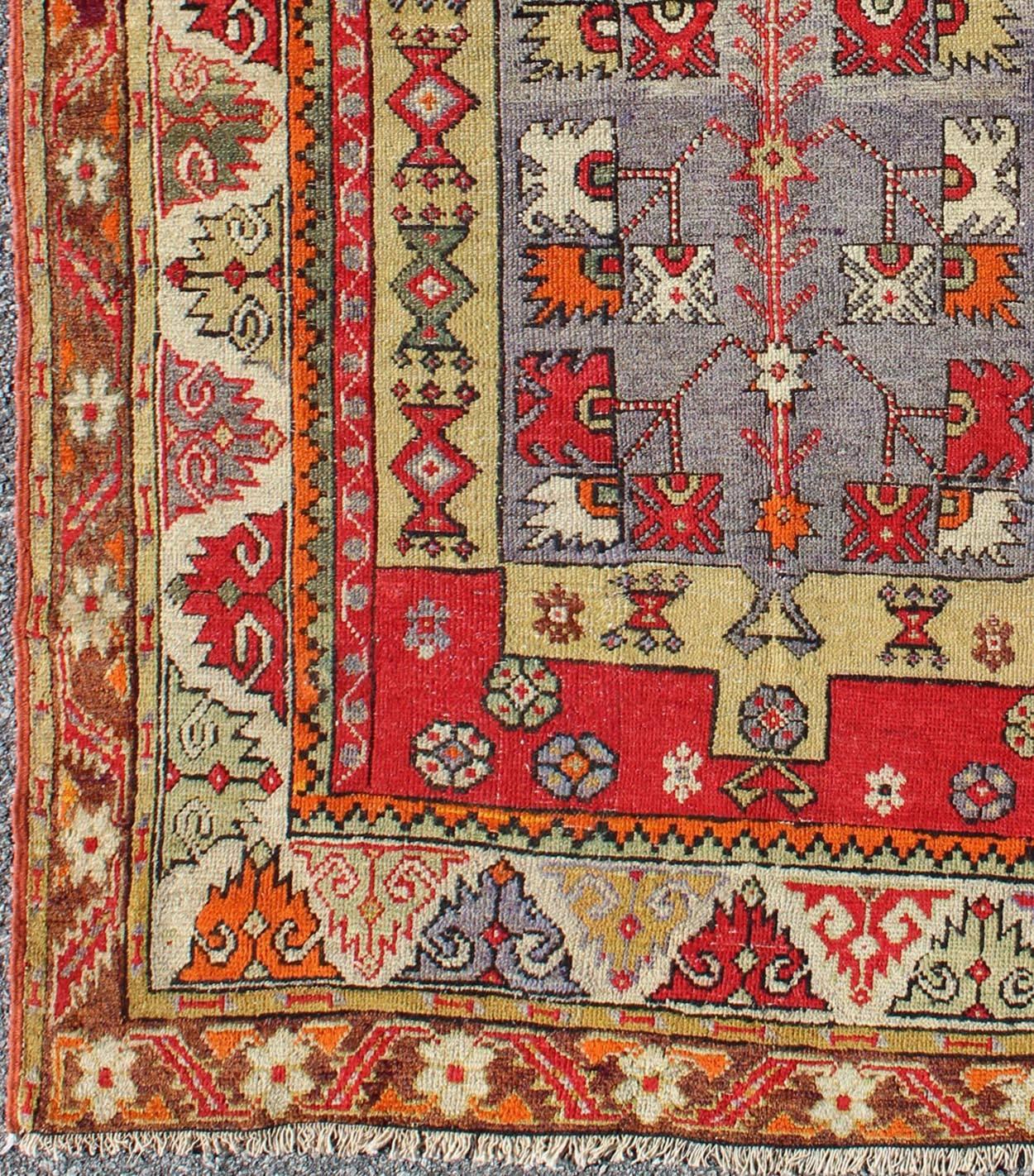 Colorful Antique Turkish Small Oushak Carpet in Multi Layered Design.

Measures: 3'7 x 5'3

Turkish colorful Oushak Antique Carpet with Unique Blend of Colors. Keivan Woven Arts/ rug J10-1009, Origin/turkey, Antique Oushak rug. 
   
This colorful