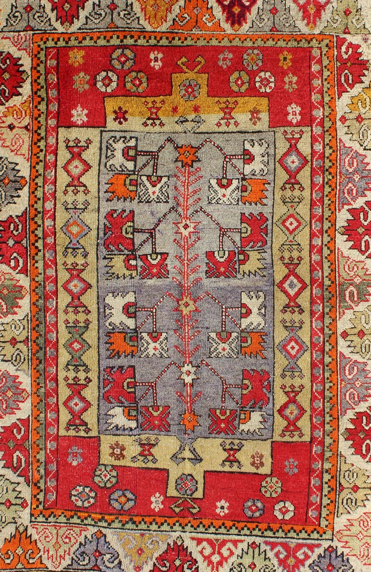 Hand-Knotted    Colorful Antique Turkish Small Oushak Carpet in Multi Layered Design For Sale