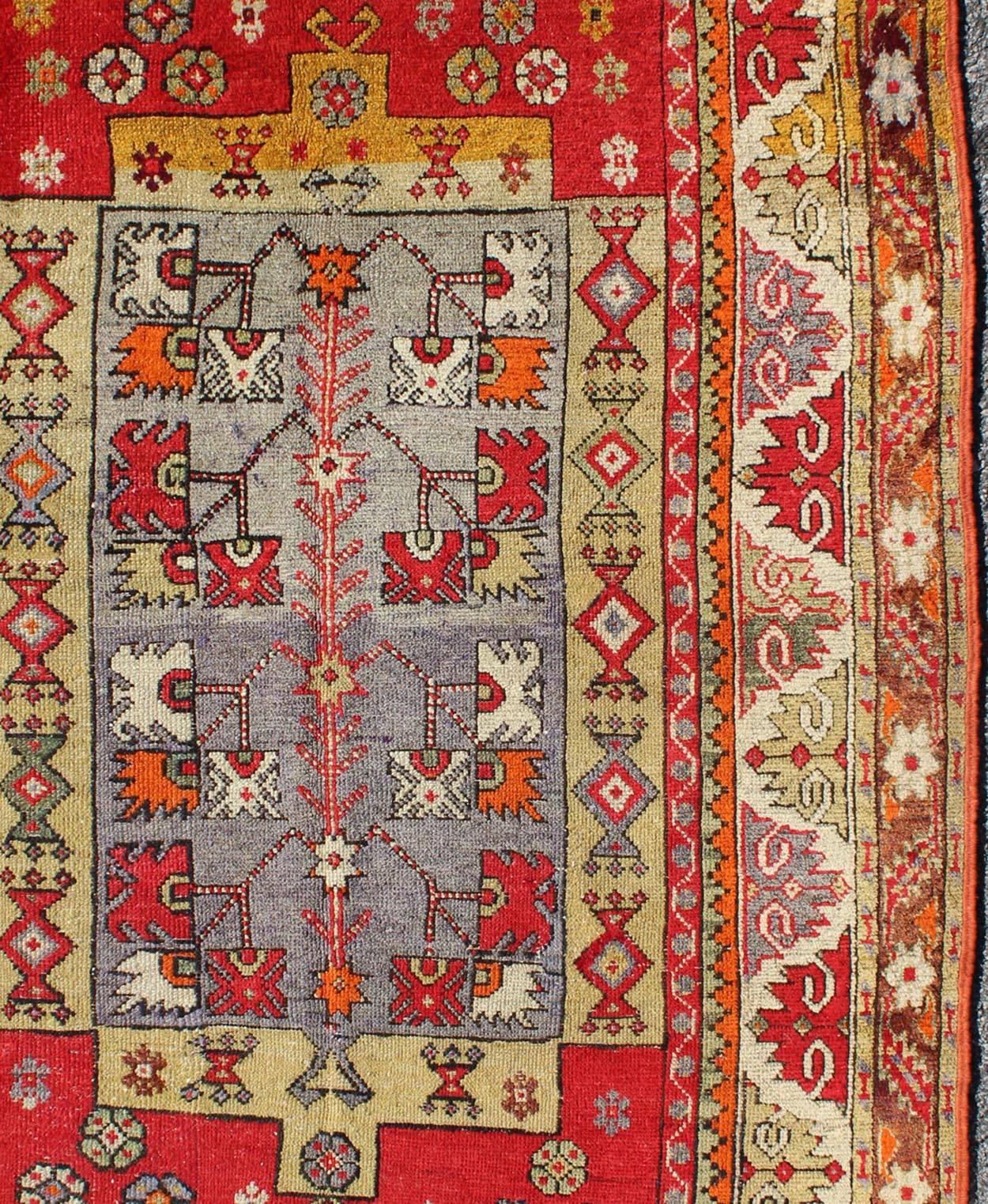    Colorful Antique Turkish Small Oushak Carpet in Multi Layered Design In Excellent Condition For Sale In Atlanta, GA