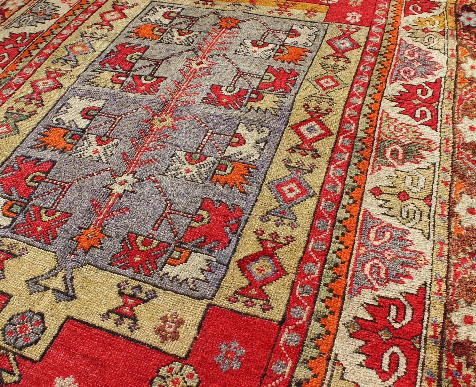 Early 20th Century    Colorful Antique Turkish Small Oushak Carpet in Multi Layered Design For Sale