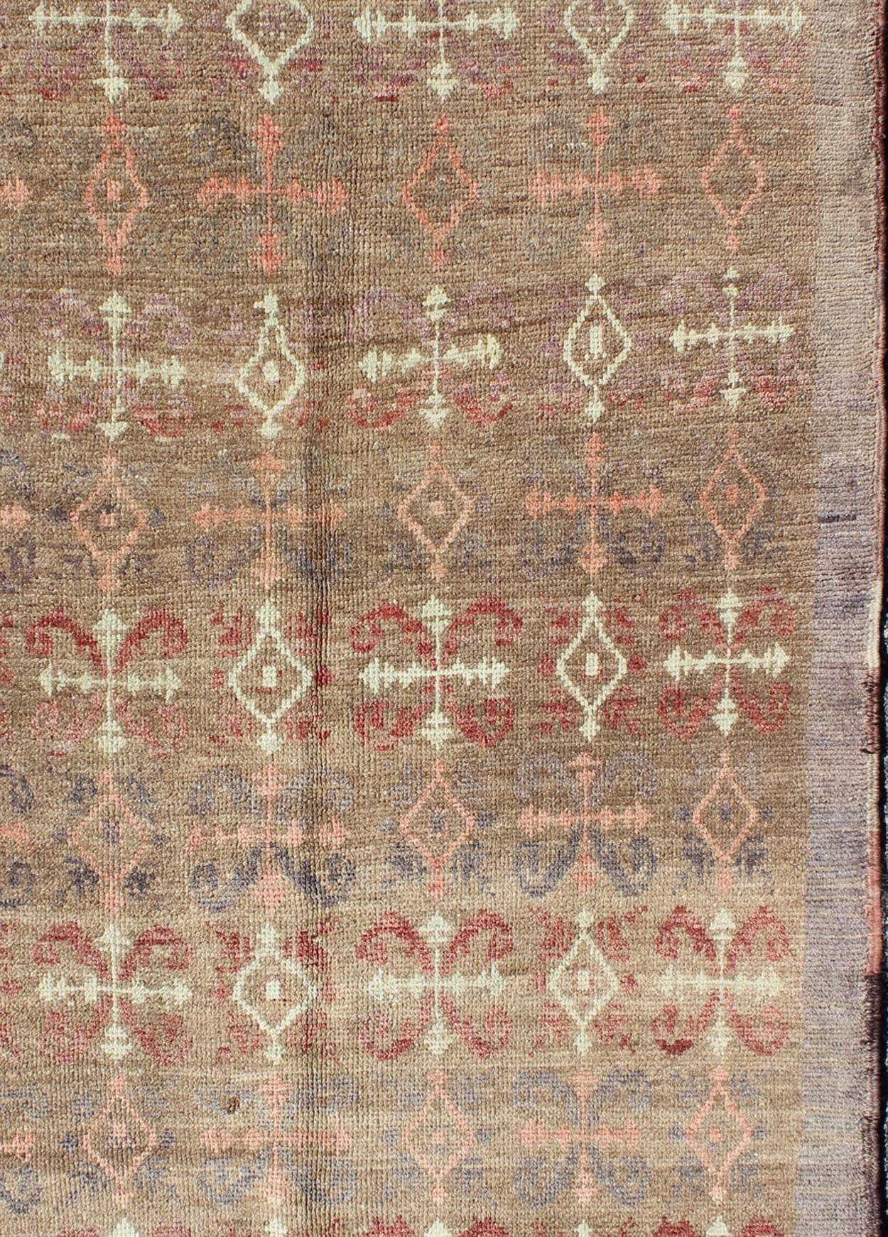 Hand-Knotted Vintage Turkish Carpet with All-Over Design Set on Light Taupe Field For Sale