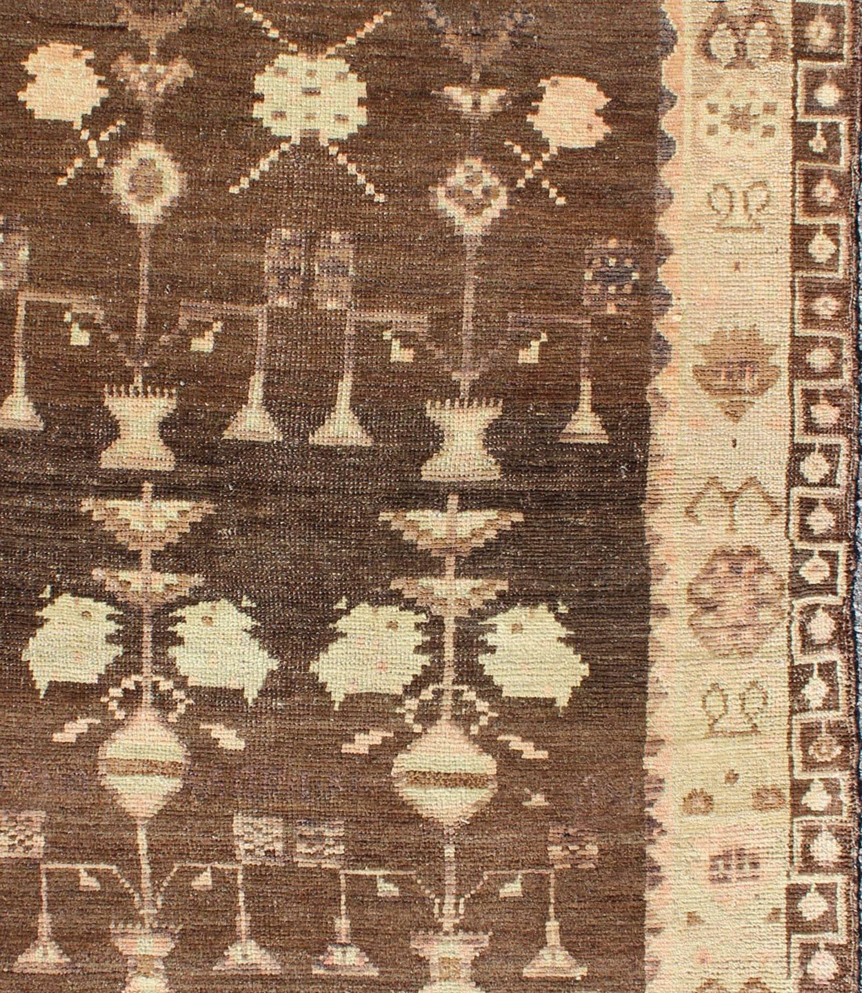 Vintage Turkish Oushak Carpet with Tribal Design Set on Brown Background In Excellent Condition For Sale In Atlanta, GA
