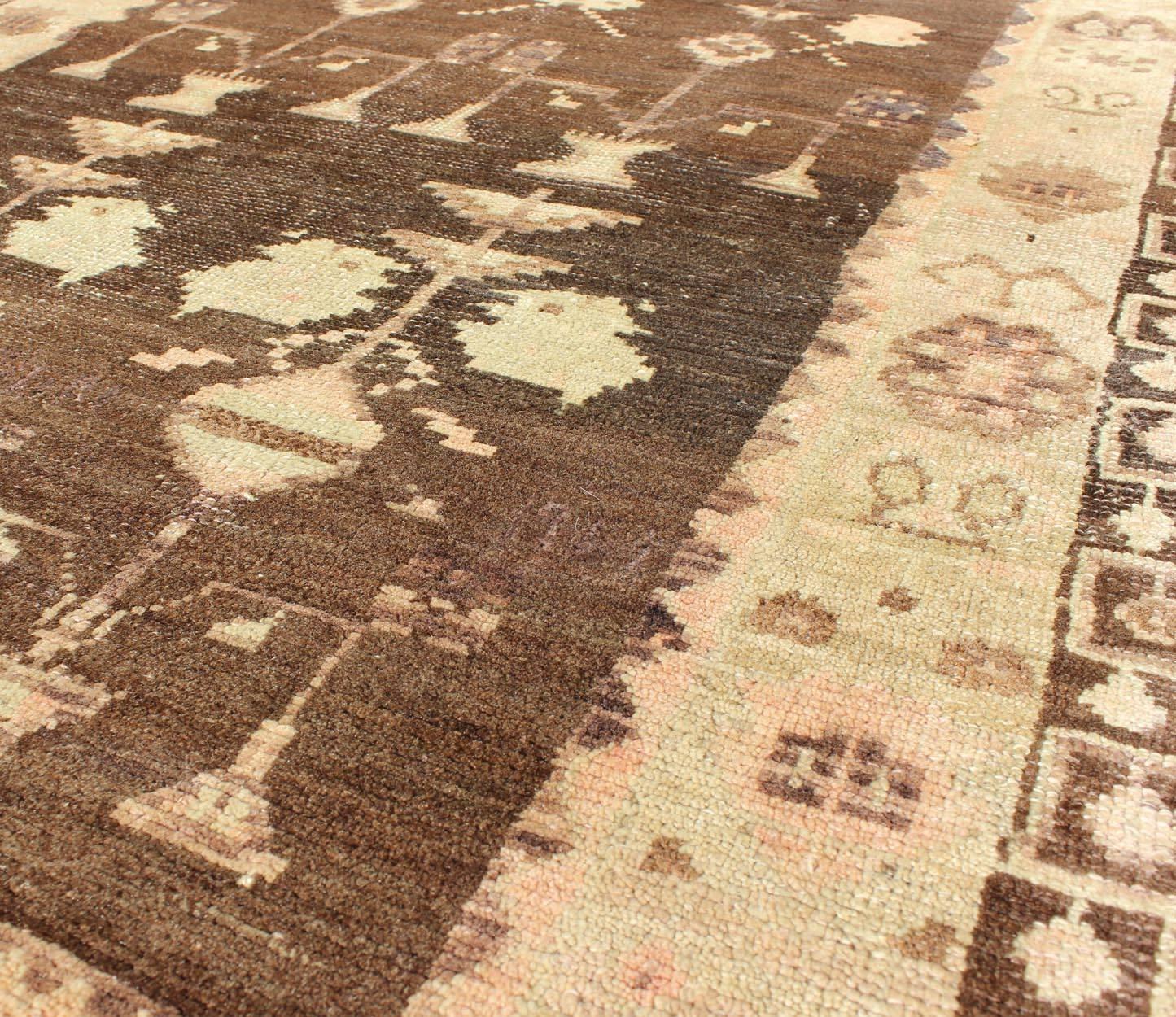 20th Century Vintage Turkish Oushak Carpet with Tribal Design Set on Brown Background For Sale