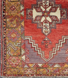 Geometric Vintage Turkish Oushak Carpet in soft Red, Light Purple, & Gold Border