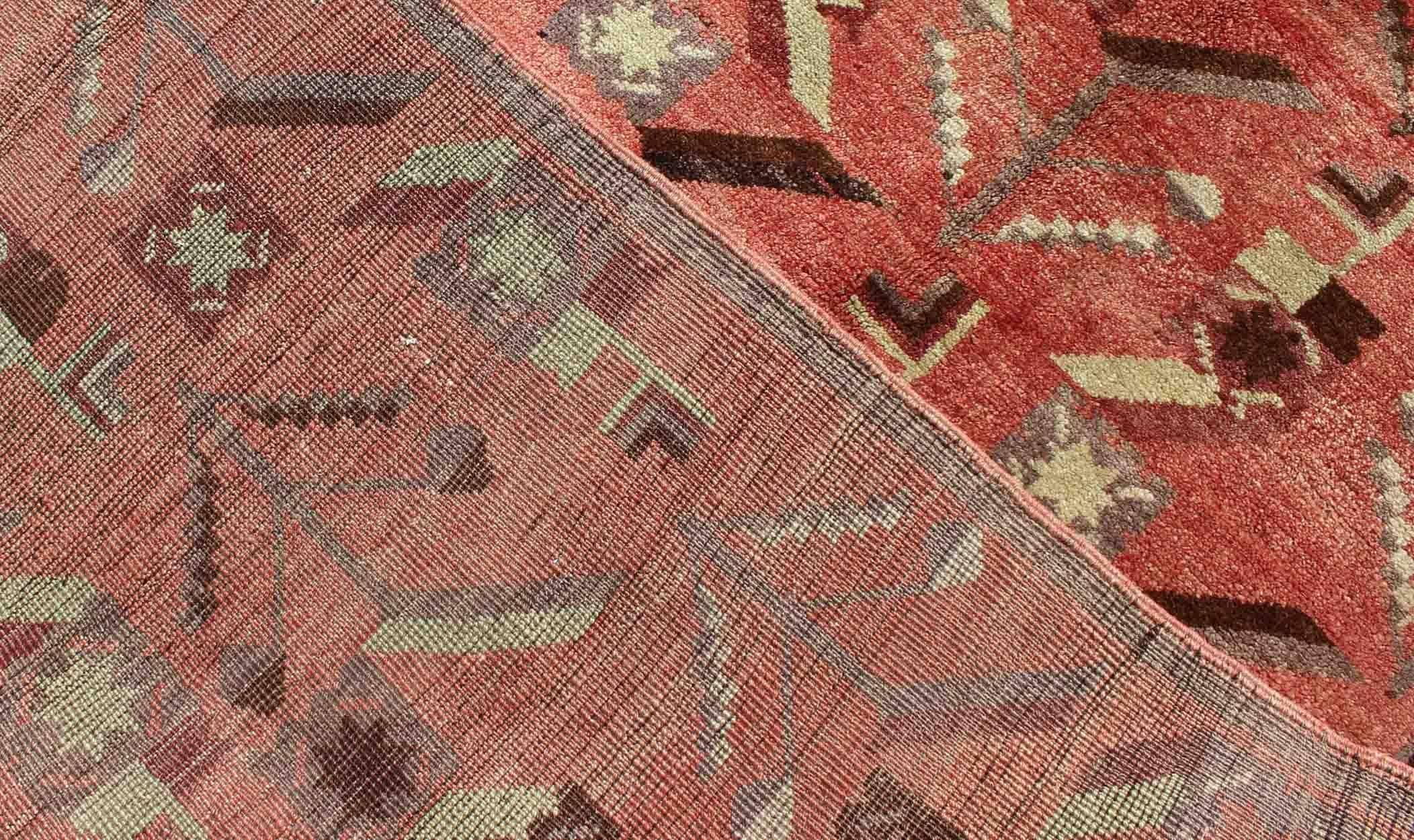 Wool Turkish Oushak Vintage Carpet with Tribal Figures Set soft Red Pink Background For Sale