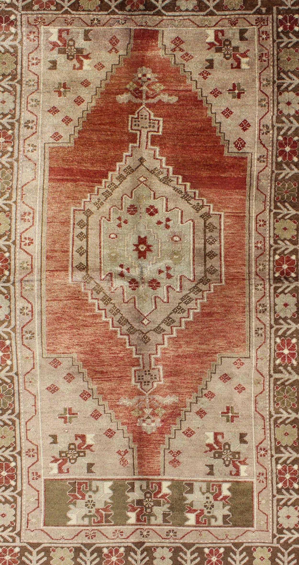 Turkish Vintage Oushak Rug With Geometric Motifs in Terracotta, Green and Tan For Sale