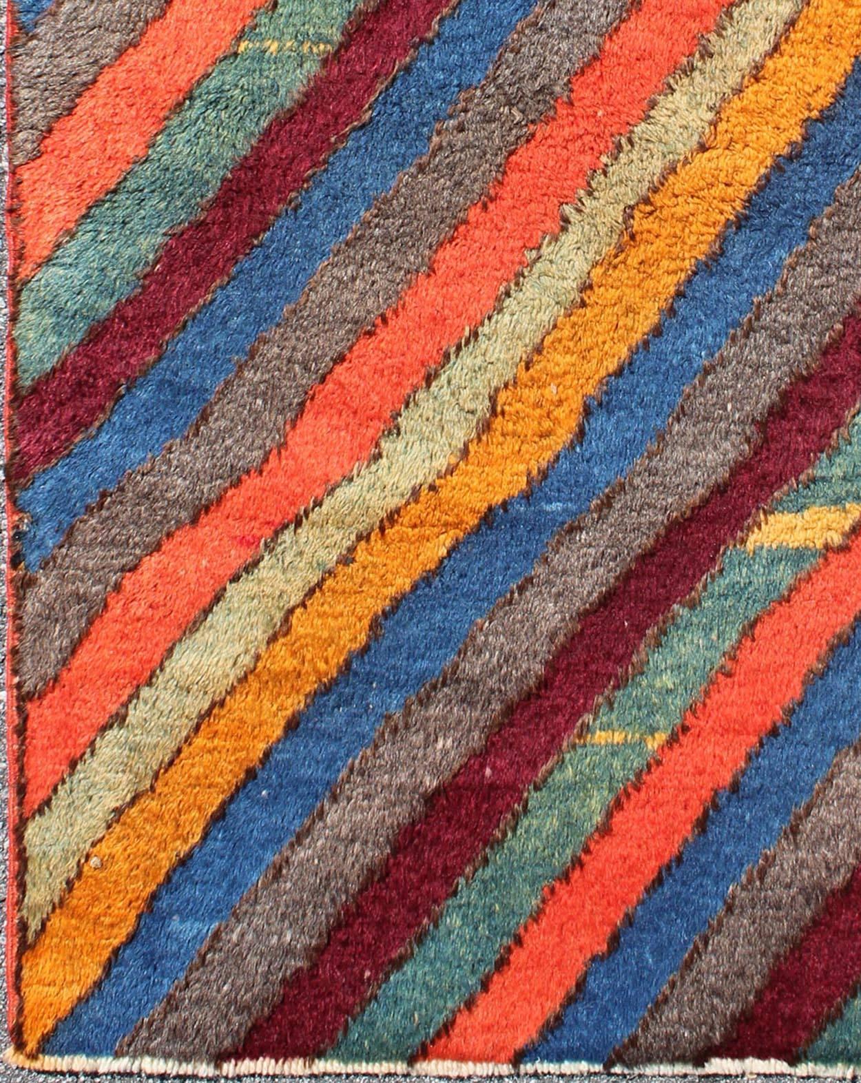 Colorful Vintage small Tulu rug. Vintage Turkish Tulu Rug with Horizontal Stripes, Keivan Woven Arts/ rug#EN-140719 , origin/Turkey, Vintage Wool Tulu, vintage Moroccan rug, stripe Moroccan. 

Measures: 2'11 x 4'10.

This unique Tulu carpet bears a