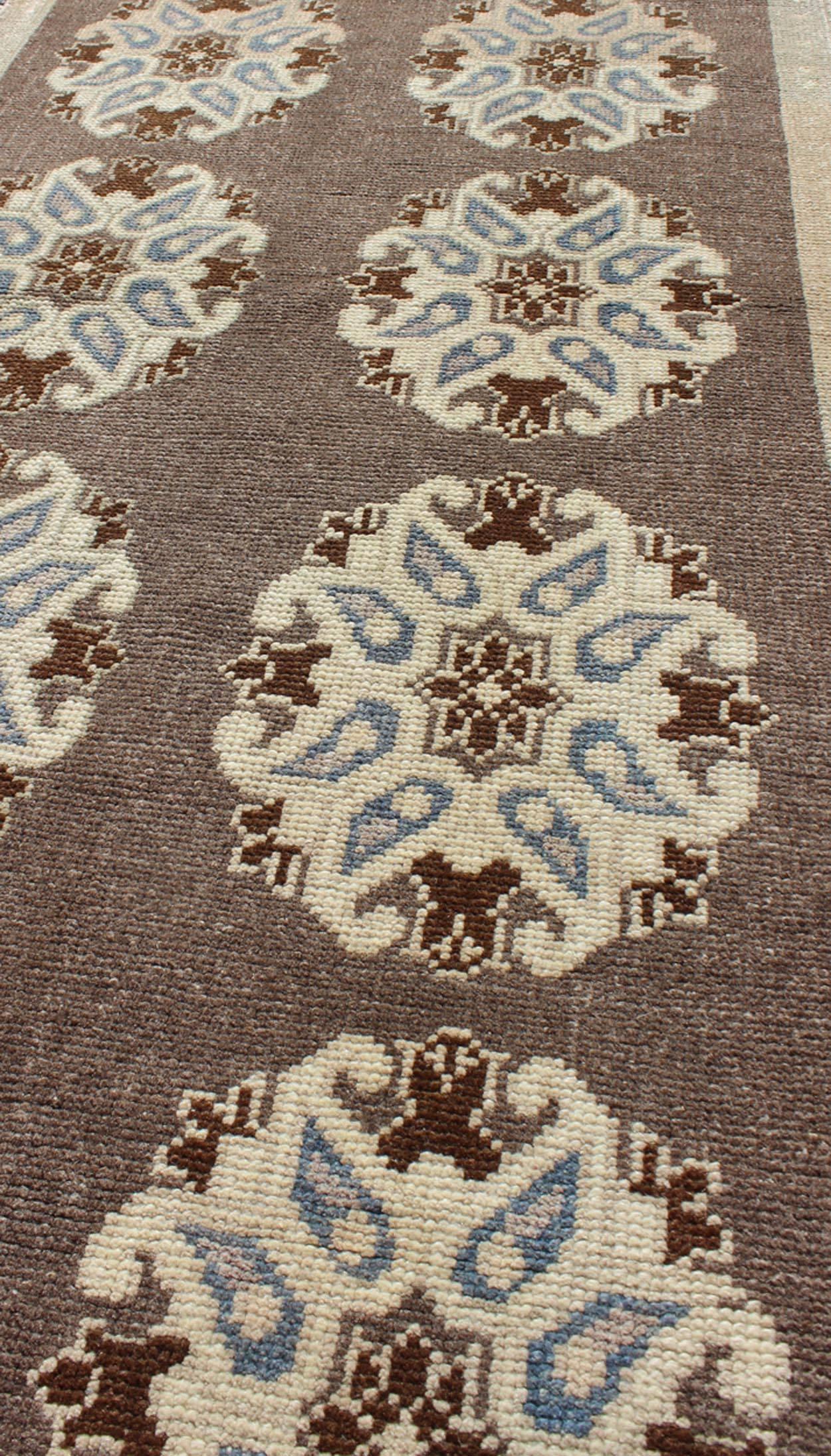 20th Century Tribal Turkish Oushak Carpet with Floral Medallions in Taupe, Ivory and Blue For Sale