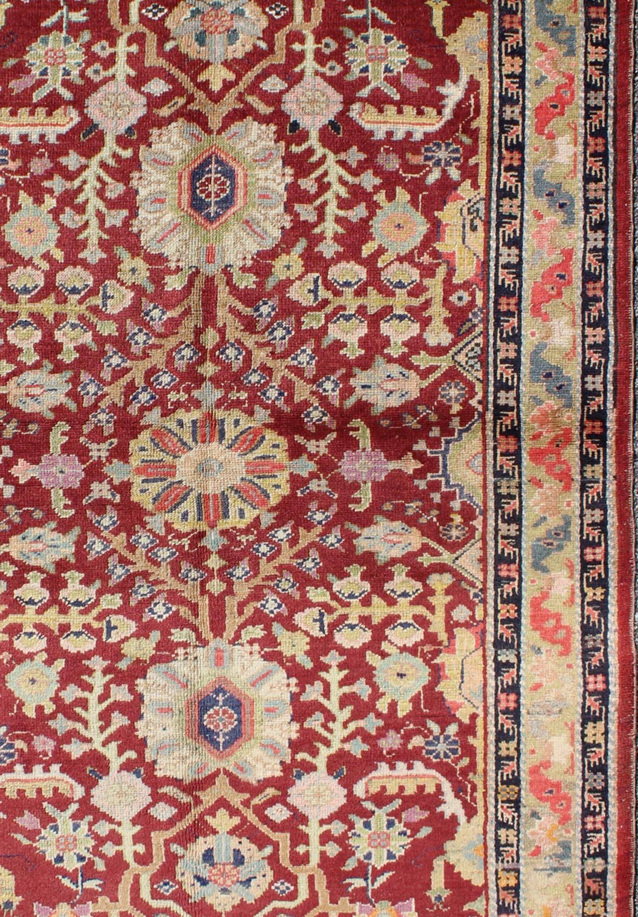 Colorful Turkish Oushak Carpet with Scattered Vines and Flowers on a Red Field In Excellent Condition For Sale In Atlanta, GA
