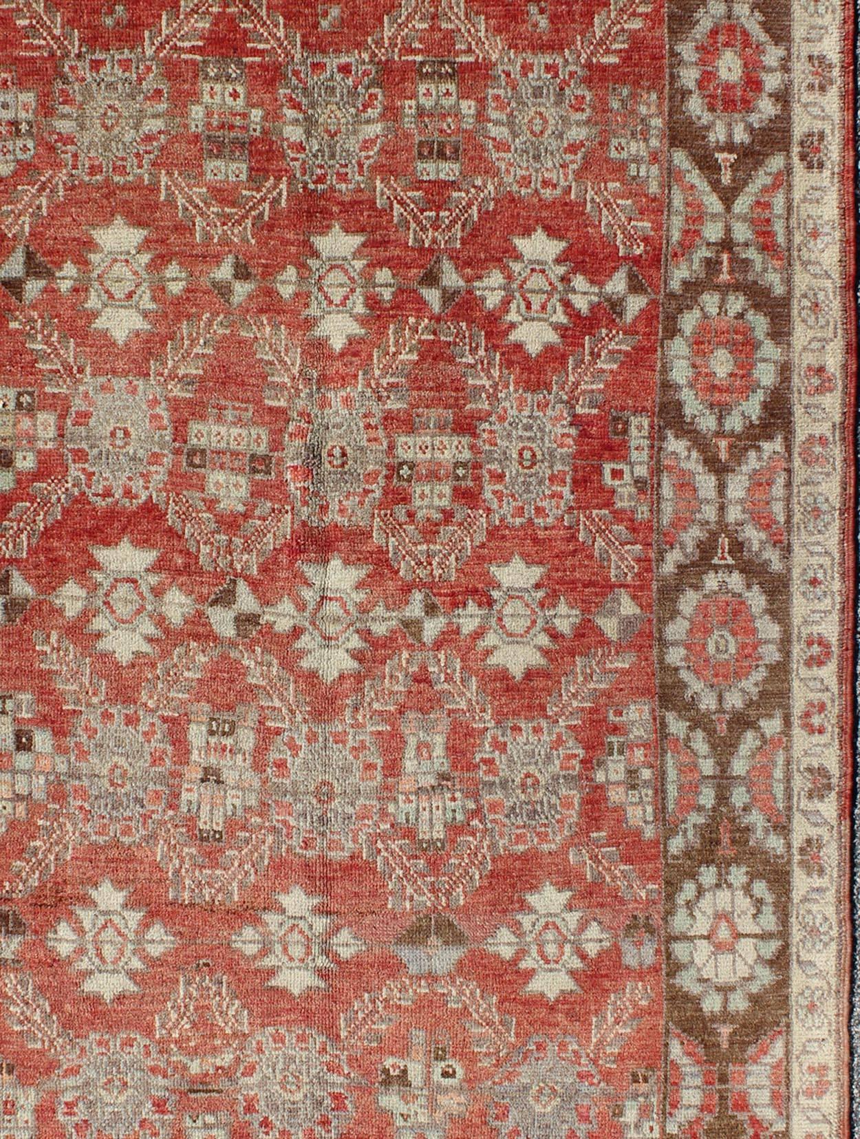 Hand-Knotted Oushak Rug With Interconnected Floral Designs in Red, Brown & Light Green For Sale