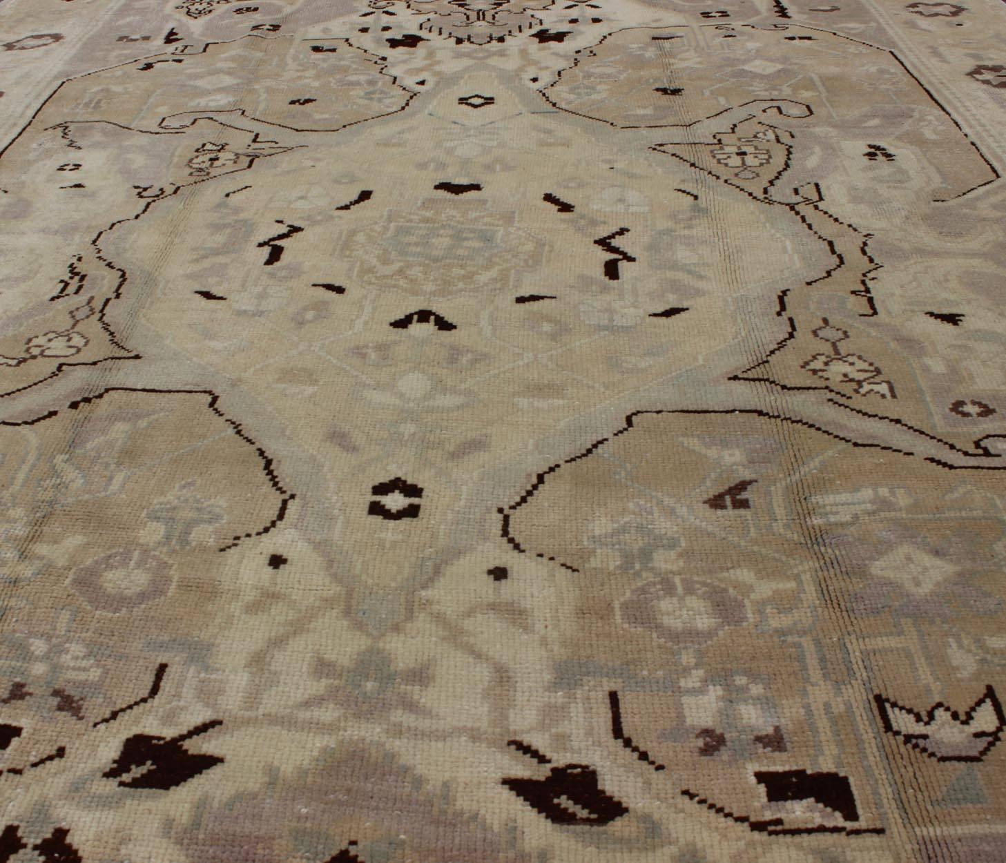 Wool Earthy Vintage Turkish Oushak Carpet with Multi-Medallions and Neutral Colors For Sale