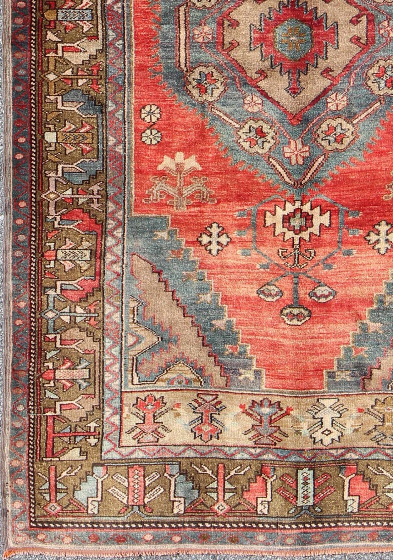 Turkish Konya Rug with Geometric Design rug/tu-sim-1
 origin/turkey 

This beautiful antique Konya carpet features a Classic medallion design. The faint red ground is home to the center medallion, which is surrounded by varying geometric tribal
