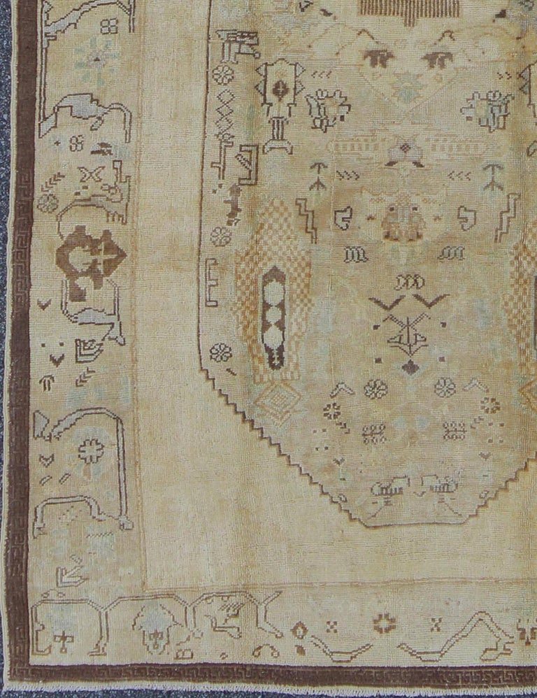 Vintage Turkish Oushak Carpet with Tribal Figures in an Earthy Color ...