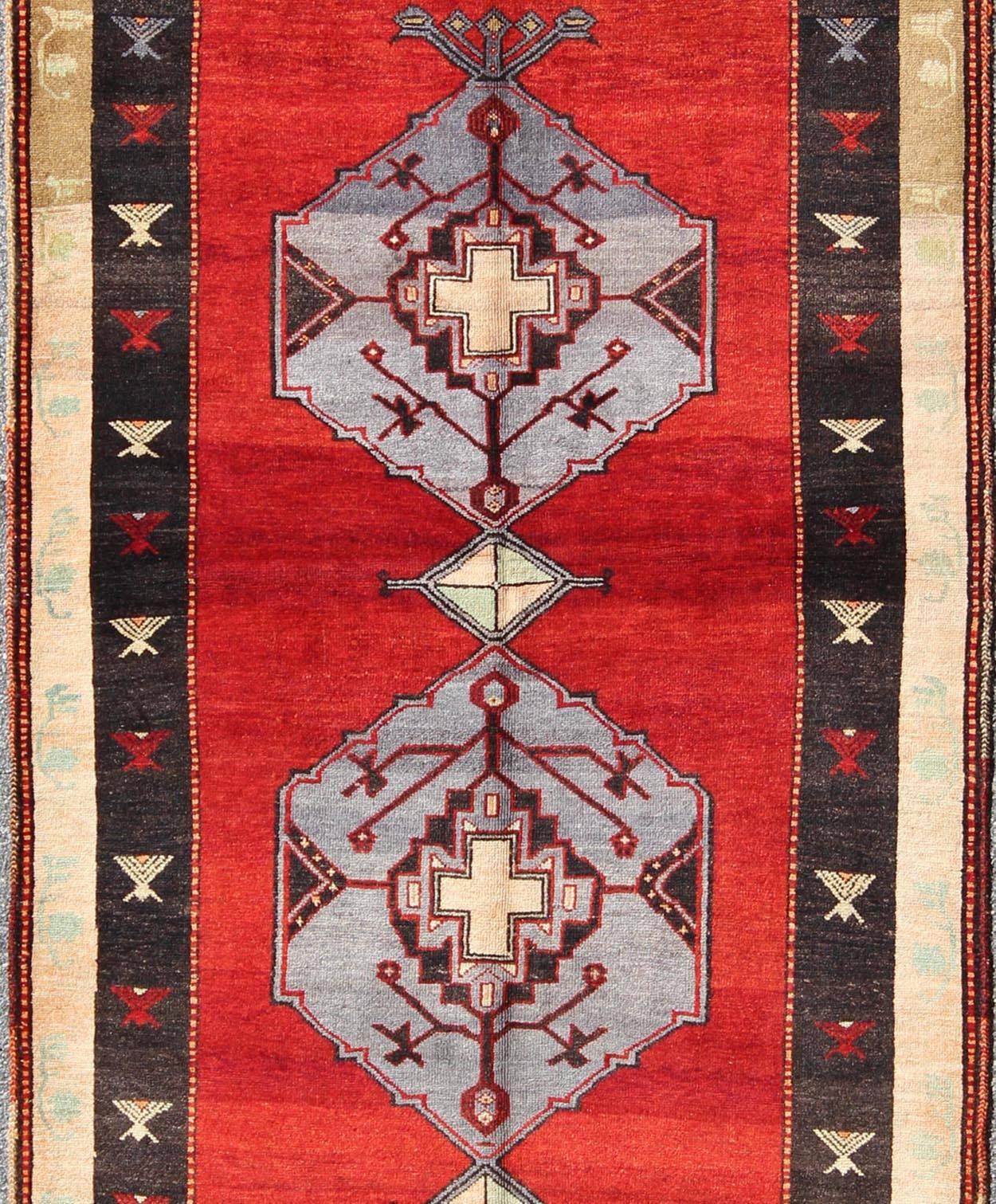 Tribal Vintage Turkish Rug With Multi-Layered Diamond Medallions in Beautiful Red For Sale