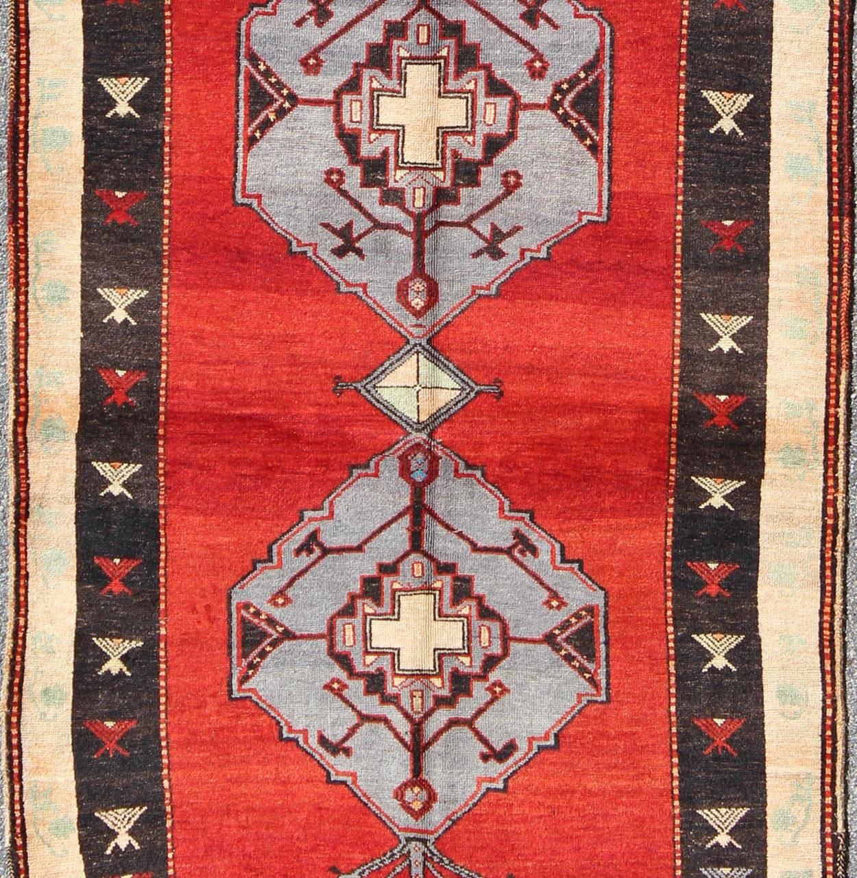 Hand-Knotted Vintage Turkish Rug With Multi-Layered Diamond Medallions in Beautiful Red For Sale