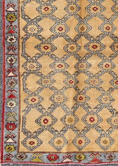 Vintage Turkish Oushak Rug with Golden Tan Field and Repeating Rosette Motif