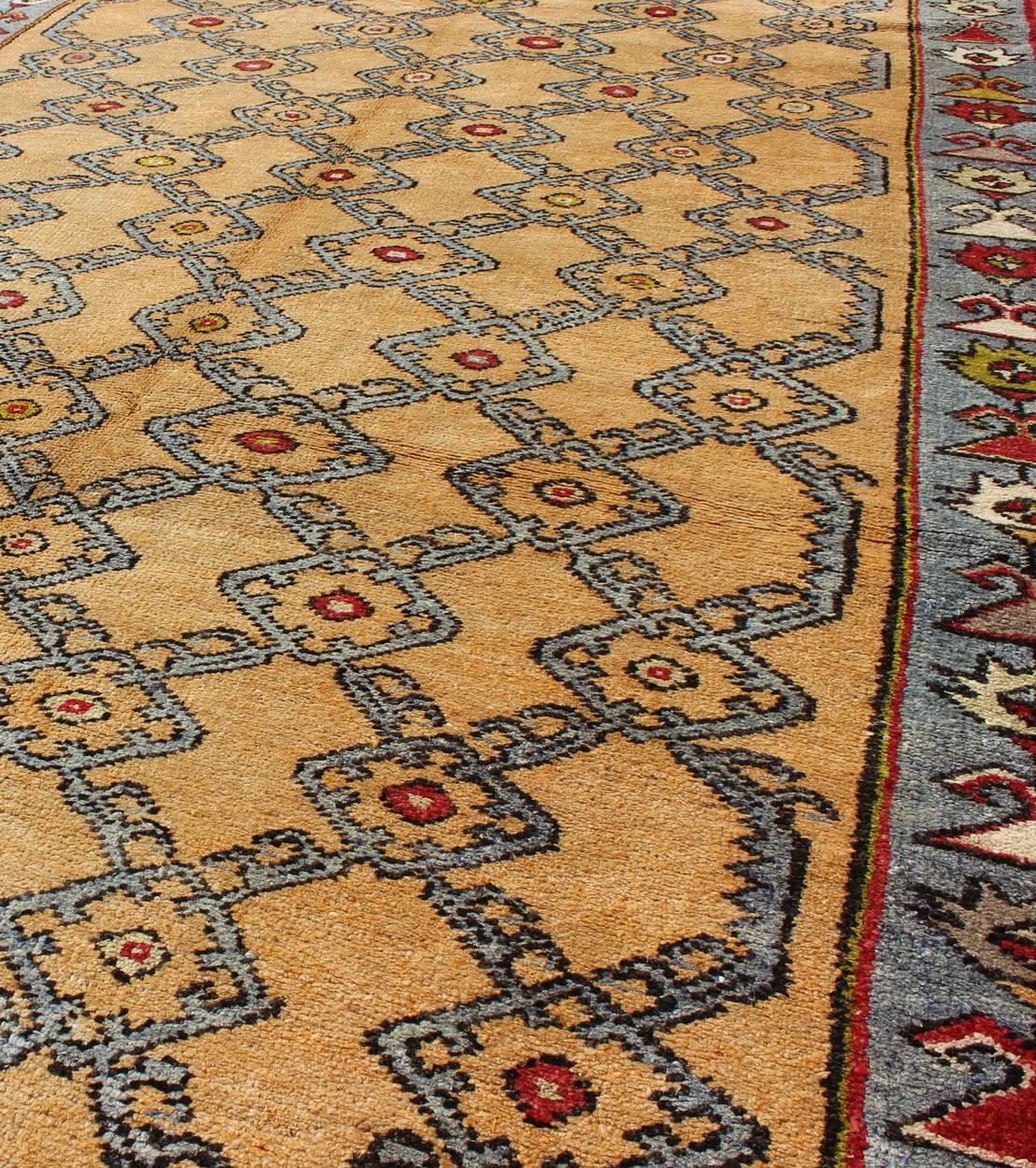 20th Century Colorful Turkish Oushak Runner with Striking Yellow Field and Geometric Motifs For Sale