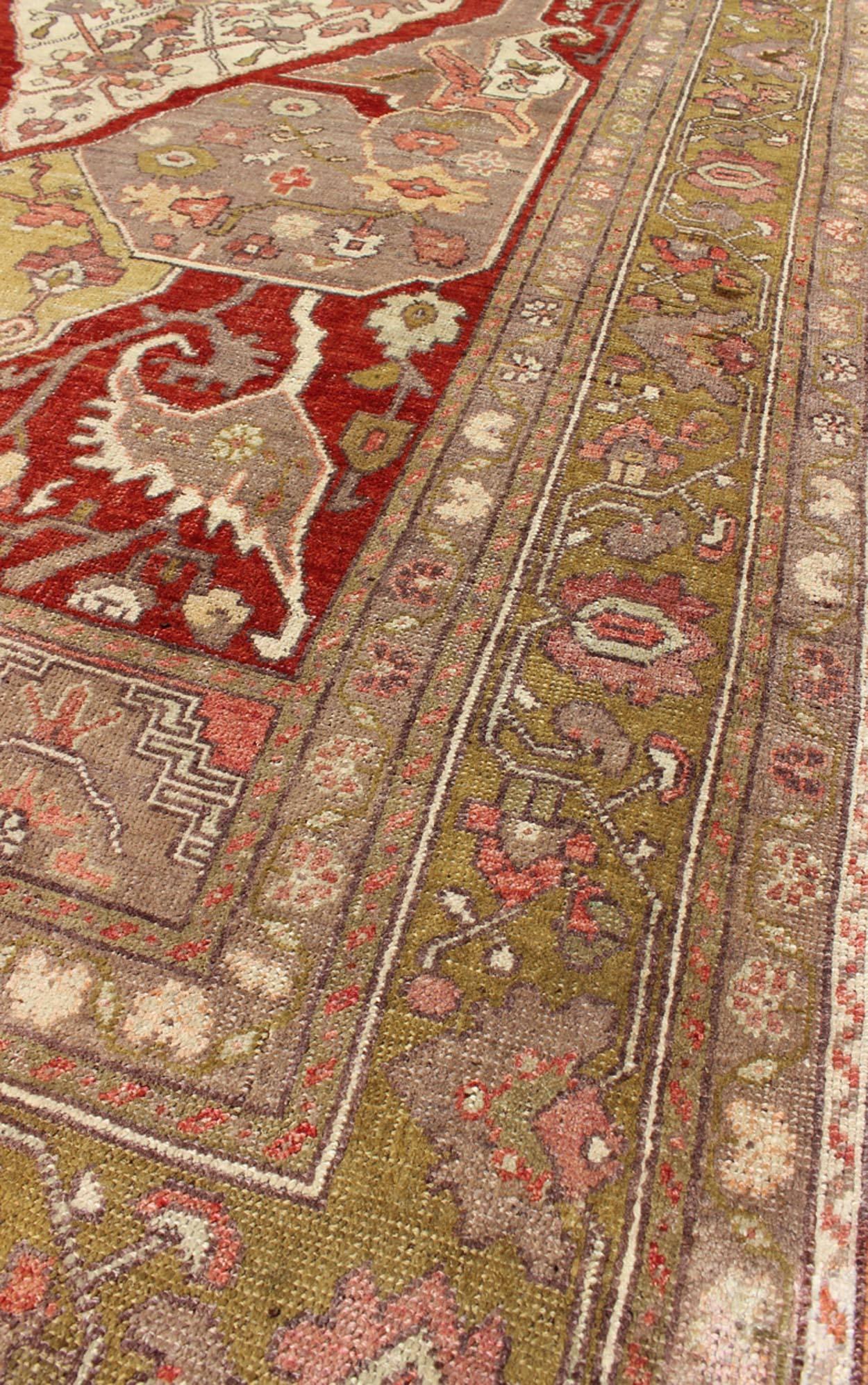Hand-Knotted Unique Turkish Oushak Carpet with Medallion Design and Intricate Floral Motifs For Sale