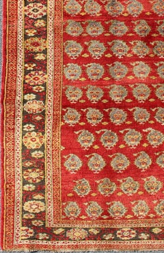 Antique Turkish Oushak Rug in Royal Red, Brown, with Rosette Pattern