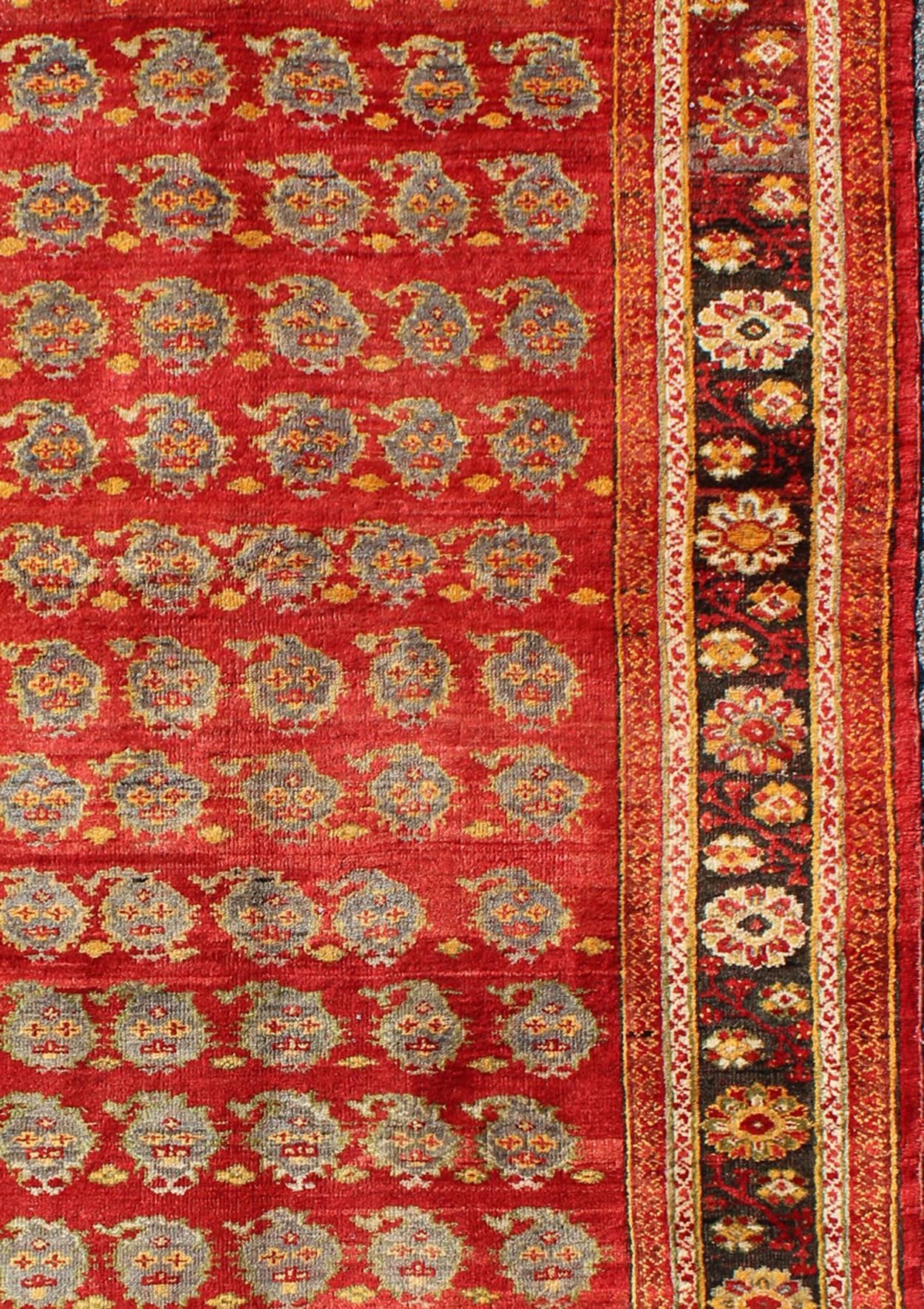 Vintage Turkish Oushak Carpet with All-Over Paisley Design and Central Red Field In Excellent Condition For Sale In Atlanta, GA
