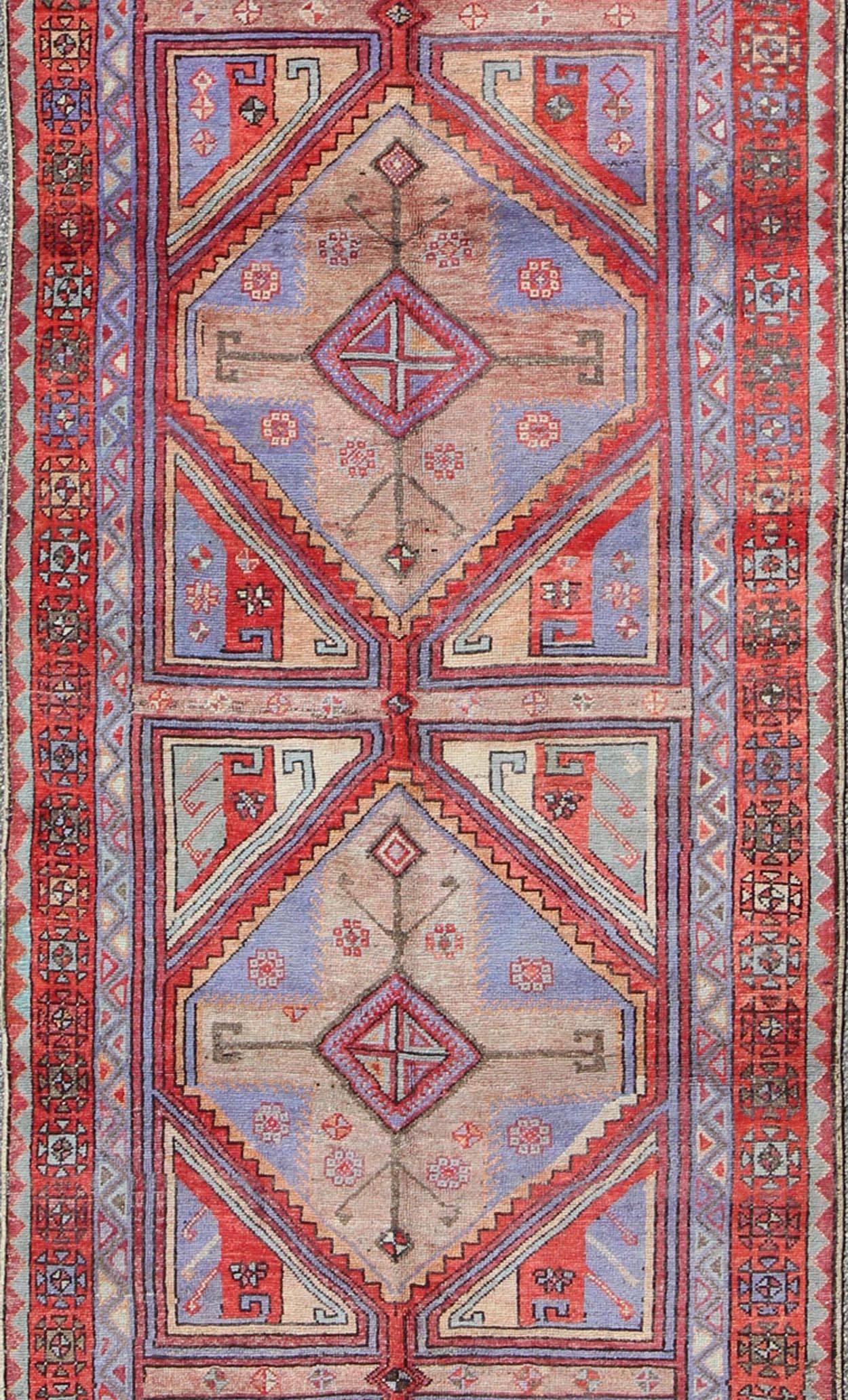 Turkish Vivid and Colorful Oushak Runner with Repeating Diamond Medallions For Sale