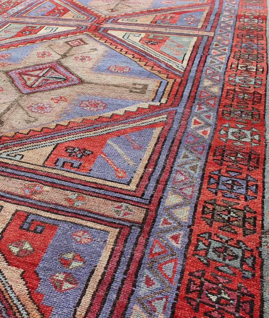 Vivid and Colorful Oushak Runner with Repeating Diamond Medallions In Excellent Condition For Sale In Atlanta, GA