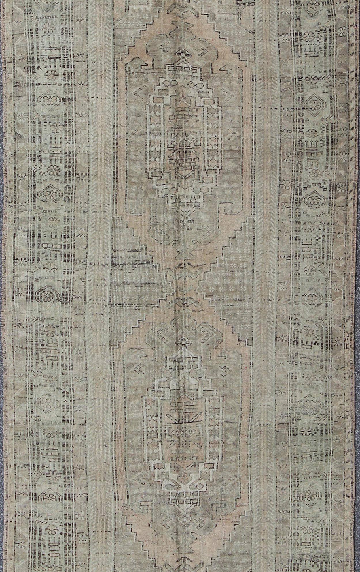 Hand-Knotted Muted Vintage Turkish Oushak Carpet with Dual-Medallion Design  For Sale