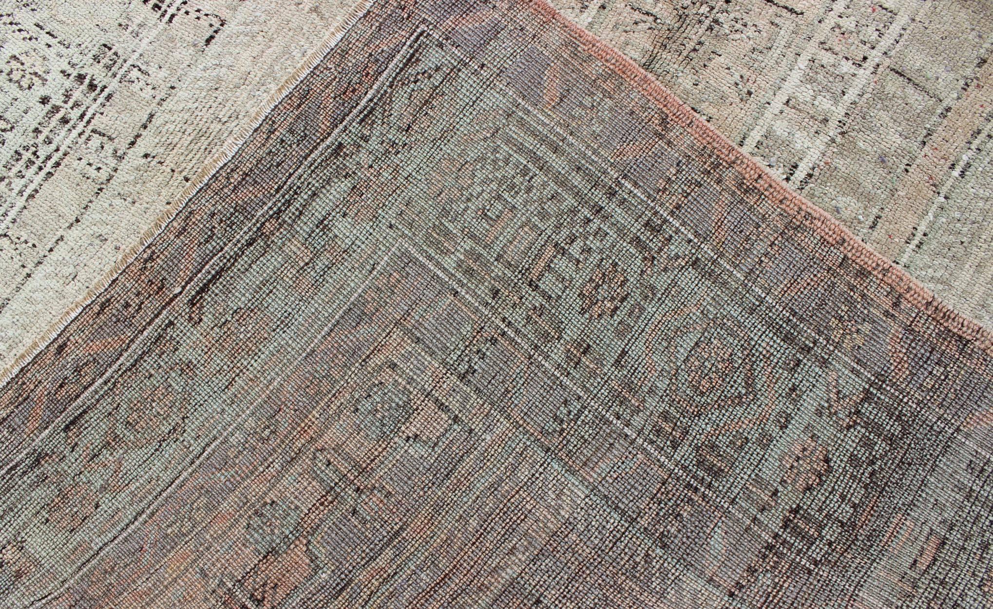 Muted Vintage Turkish Oushak Carpet with Dual-Medallion Design  1