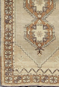 Vintage Turkish Oushak Rug with Soft Beige Field and Warm Brown Medallions