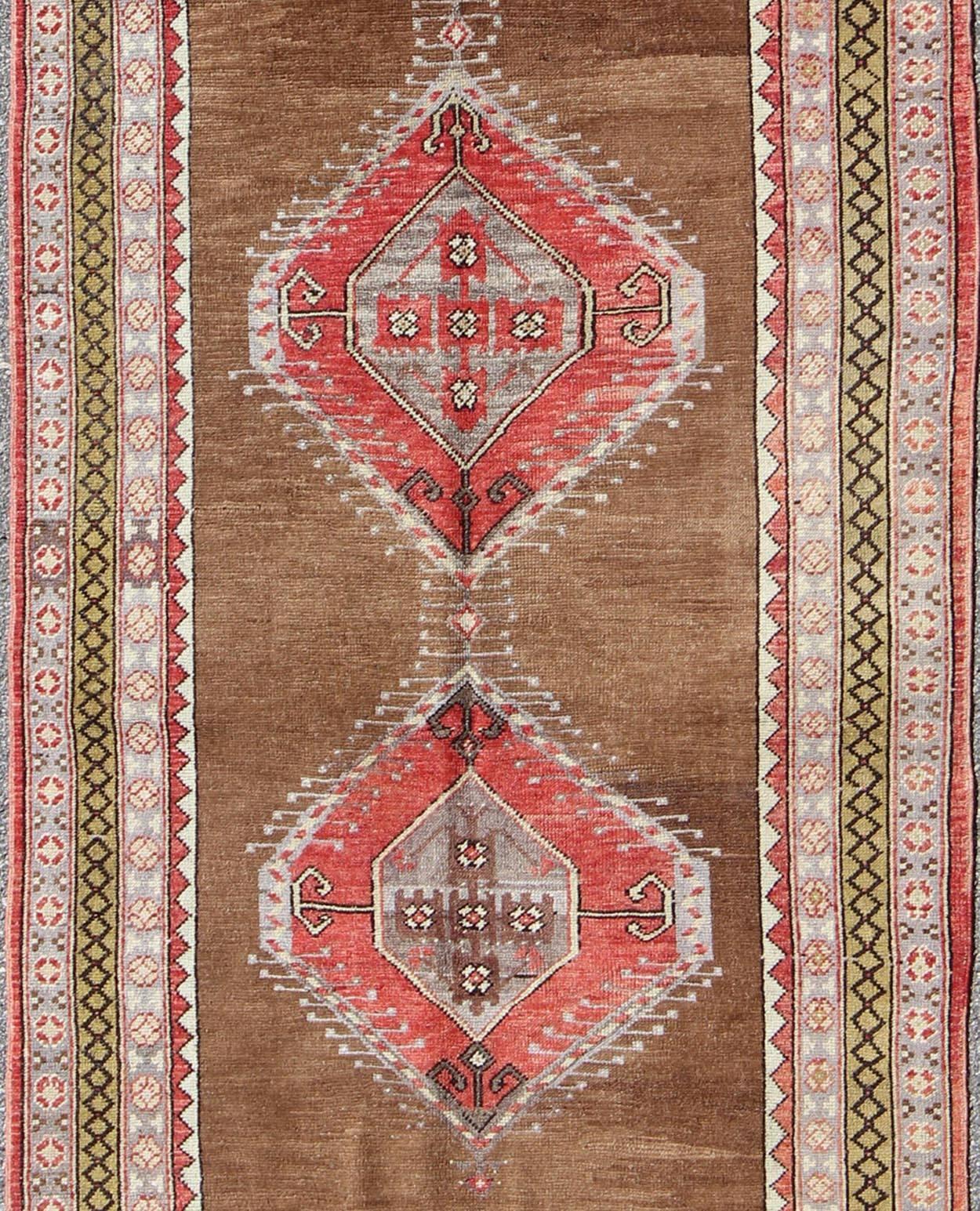 Hand-Knotted Vintage Turkish Oushak Rug with Three Large Medallions and Multiple Borders For Sale