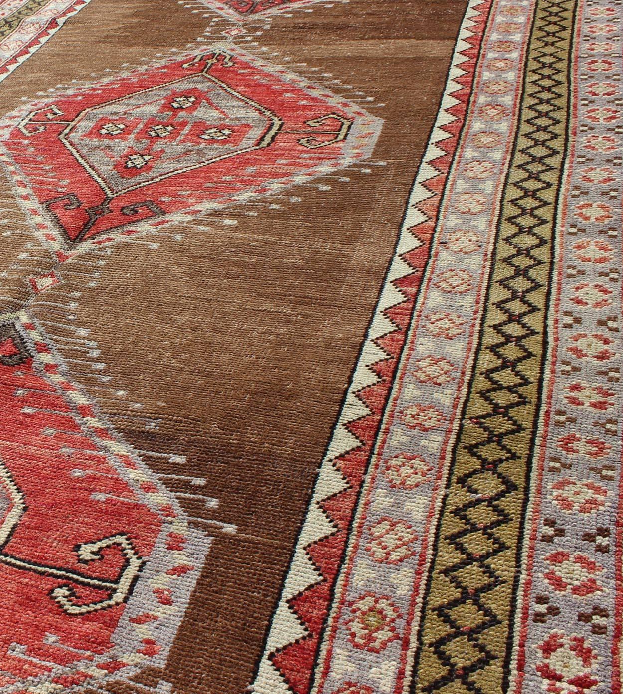 20th Century Vintage Turkish Oushak Rug with Three Large Medallions and Multiple Borders For Sale