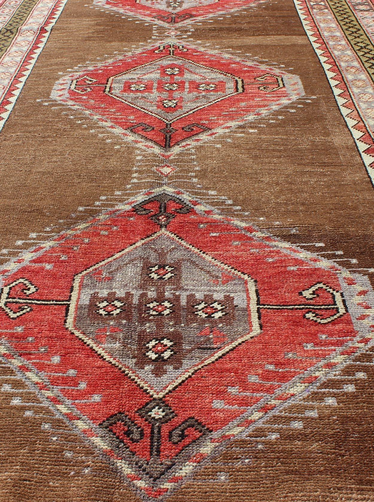 Wool Vintage Turkish Oushak Rug with Three Large Medallions and Multiple Borders For Sale