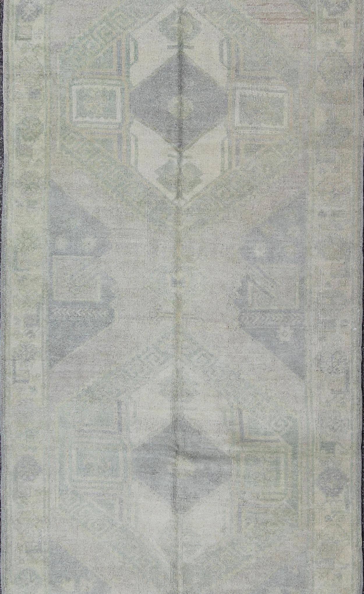 Hand-Knotted Muted Turkish Oushak Carpet with Two Diamond Medallions in Blue and Gray For Sale