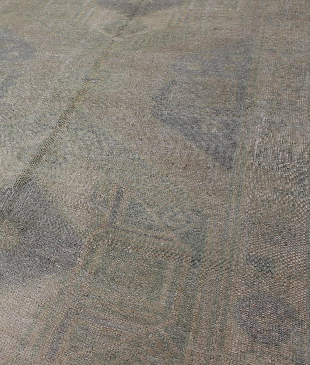 20th Century Muted Turkish Oushak Carpet with Two Diamond Medallions in Blue and Gray For Sale