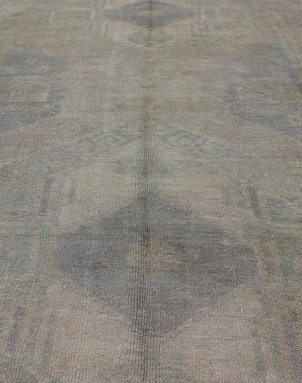 Wool Muted Turkish Oushak Carpet with Two Diamond Medallions in Blue and Gray For Sale