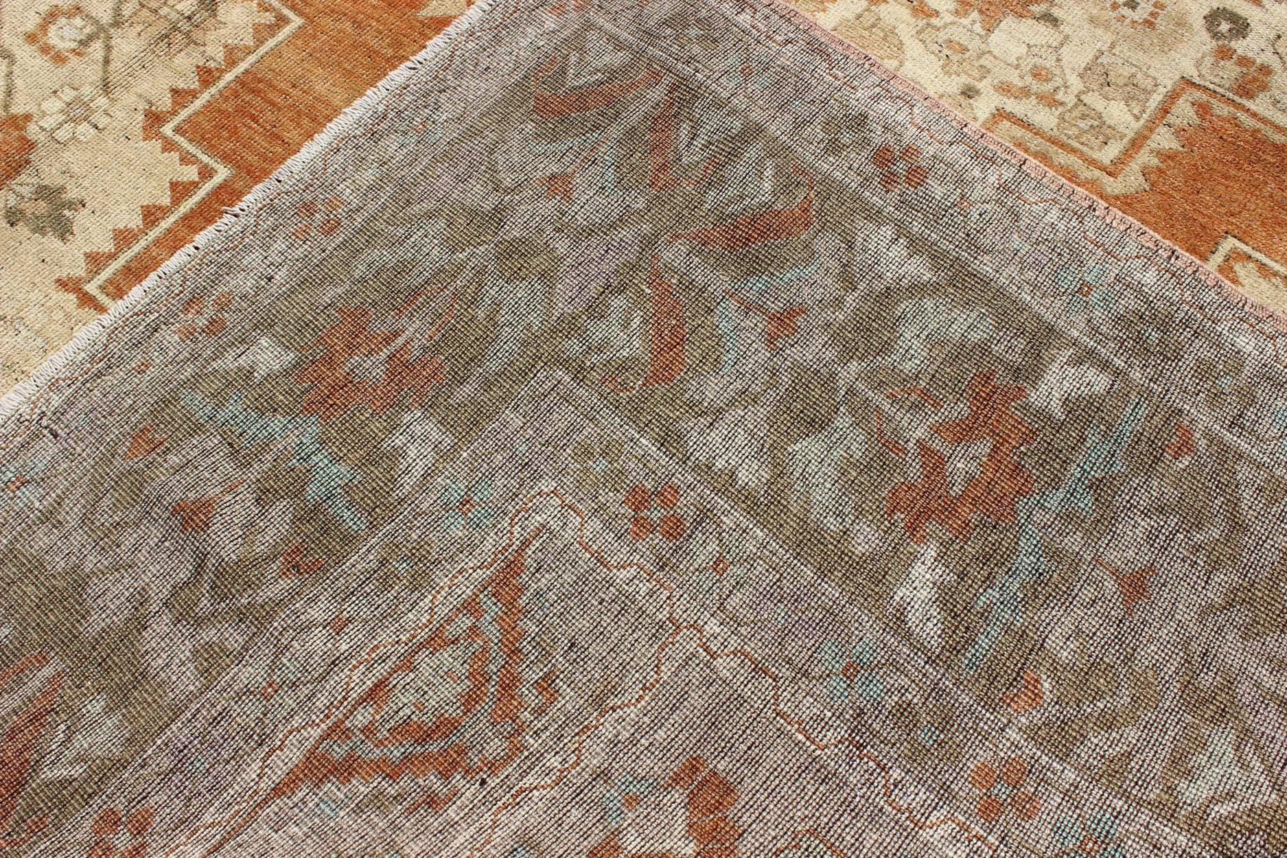 20th Century Vintage Turkish Oushak Rug in Rust, Green, Cream, Tape and Neutral Colors For Sale